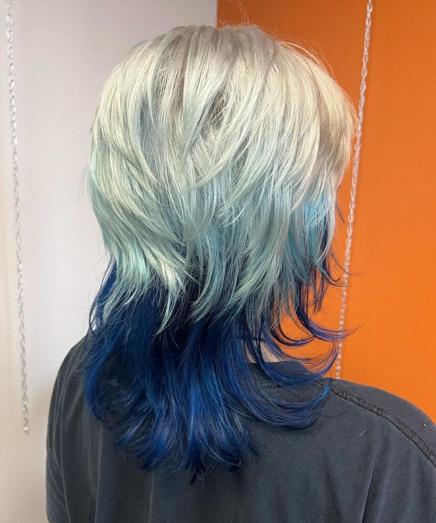 blonde and teal jellyfish haircut