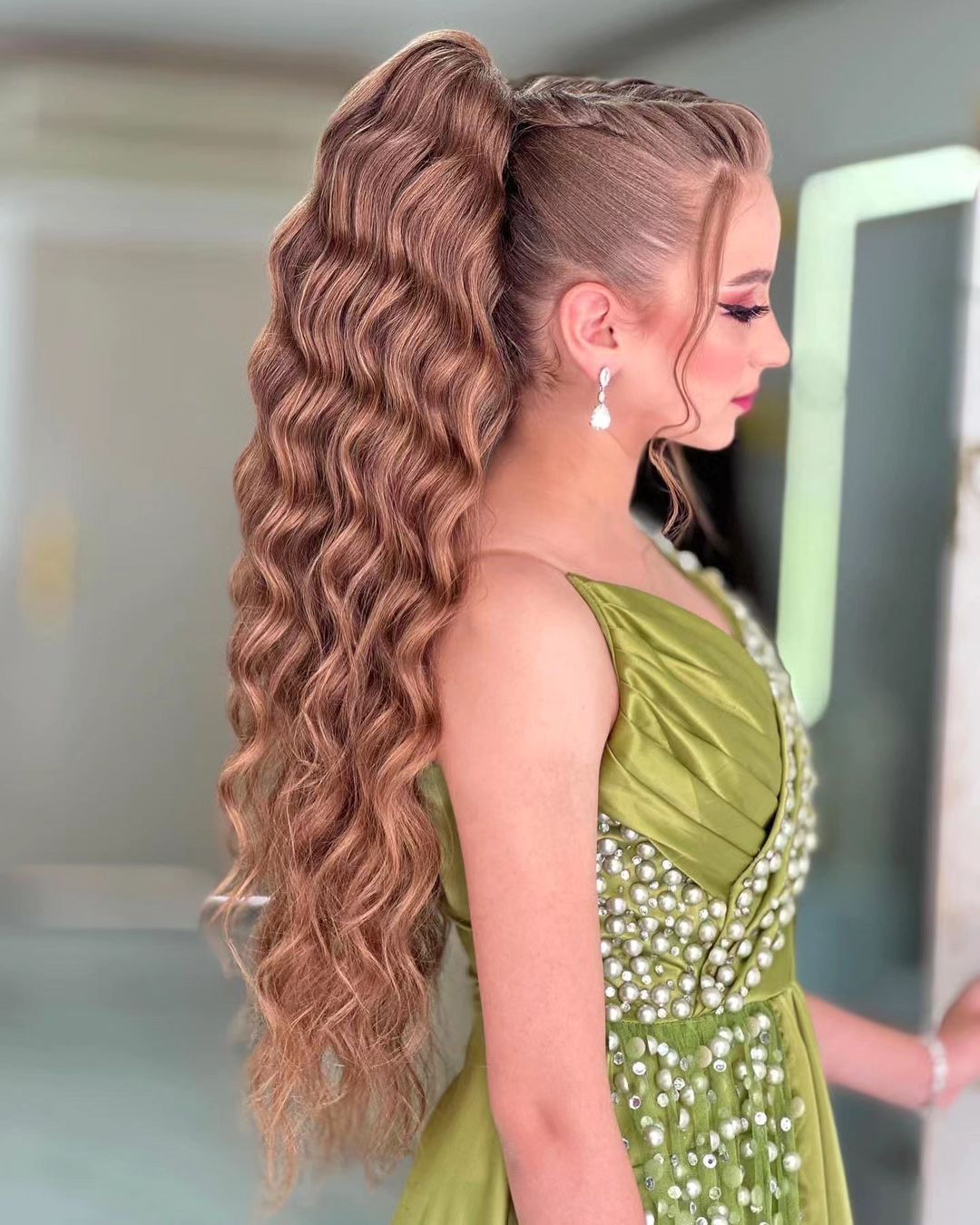 curled ponytail with braids wedding hairstyle