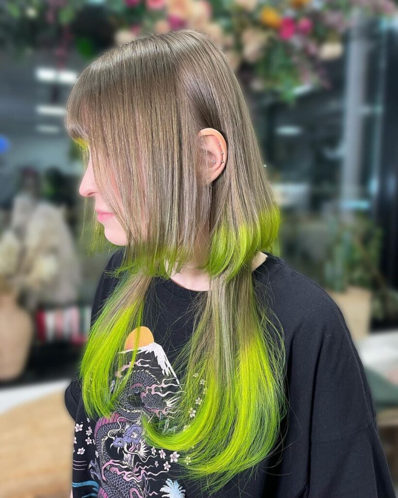 dark blonde and green jellyfish haircut