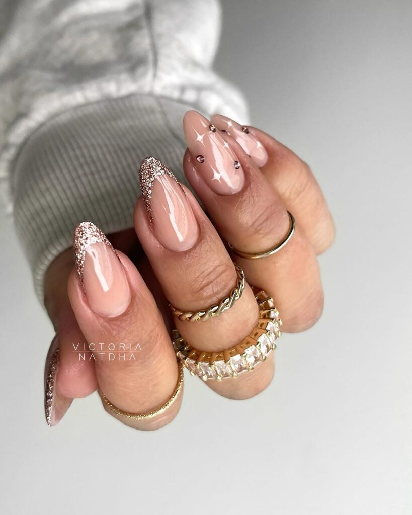 nude nails with glitter gold 