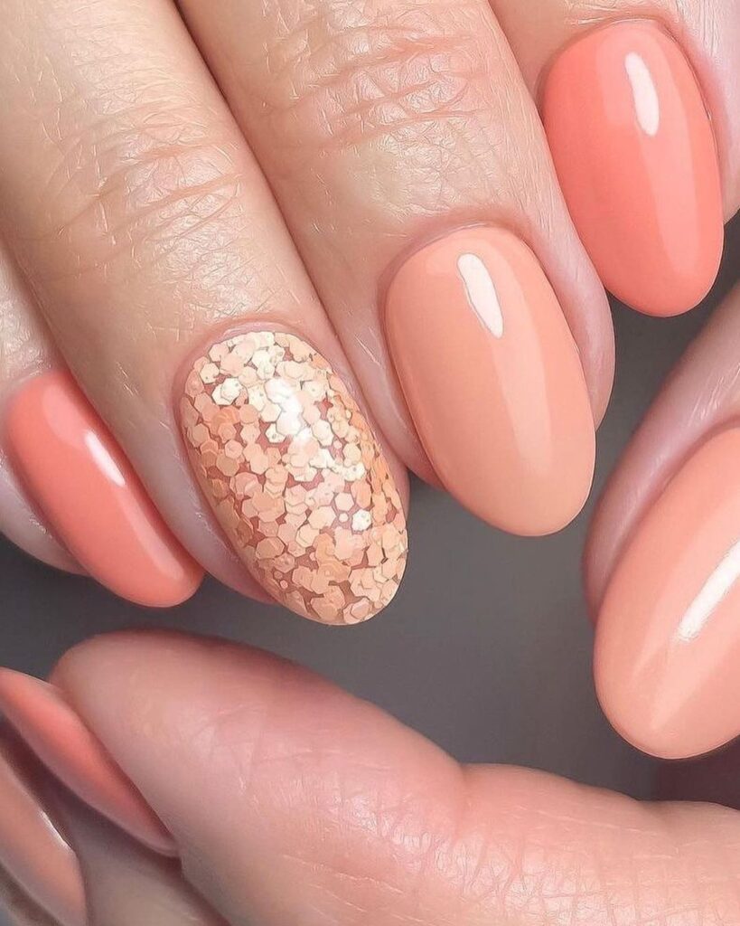 glittery peach fuzz nails