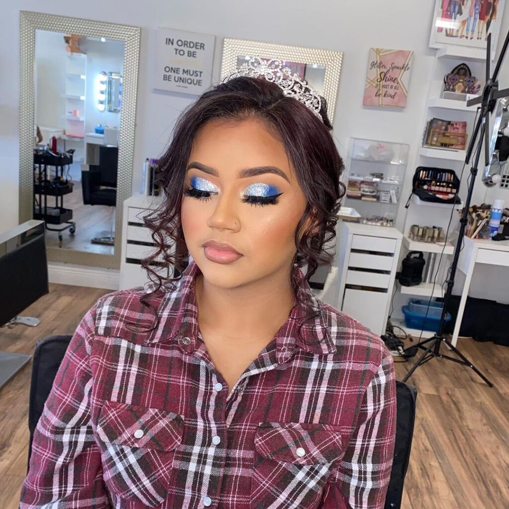 glittery blue quince makeup