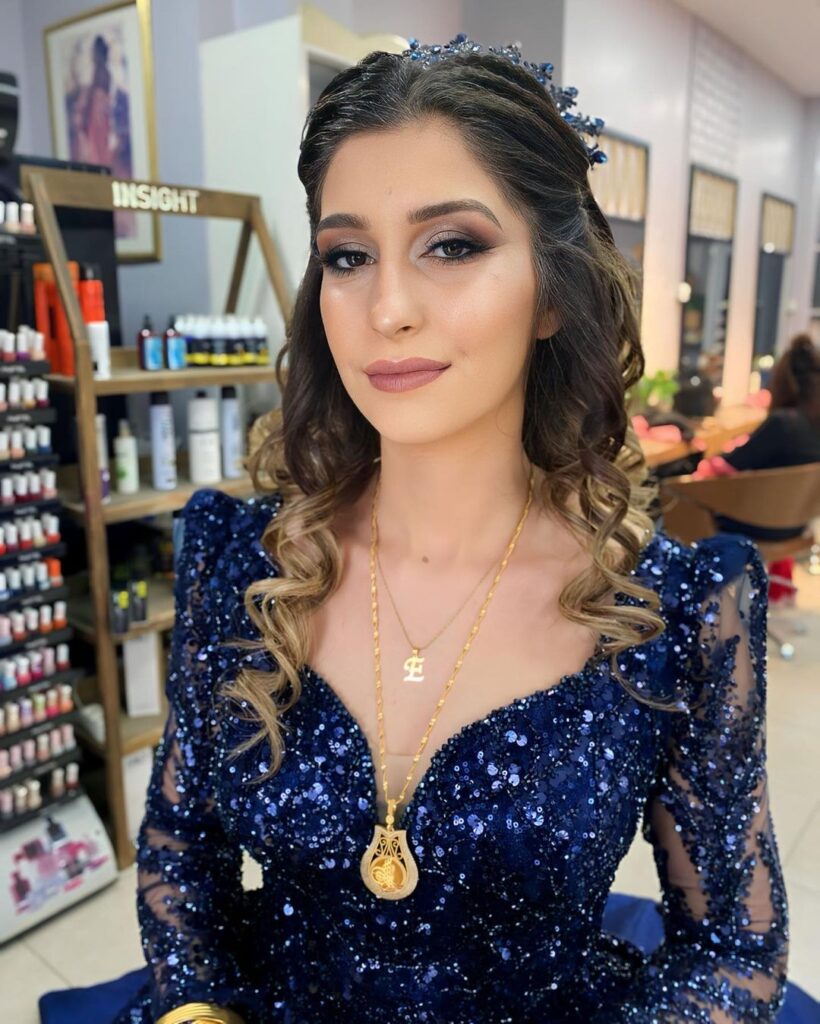 prom makeup and indigo blue gown