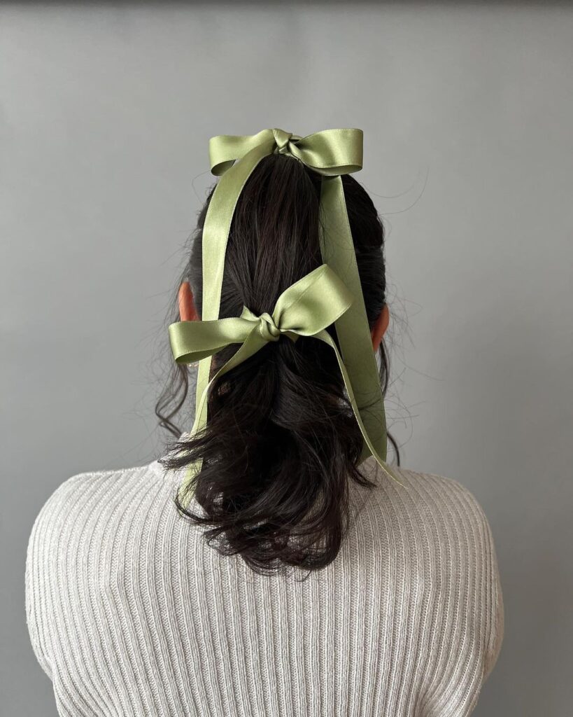 ribbons on double ponytail