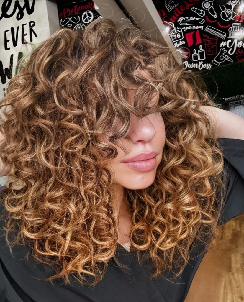 round curly cut on bronde hair 
