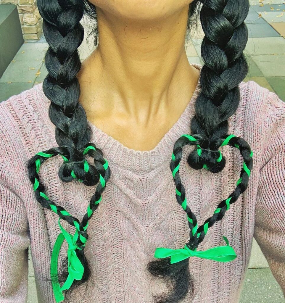 two braids with ribbon hearts