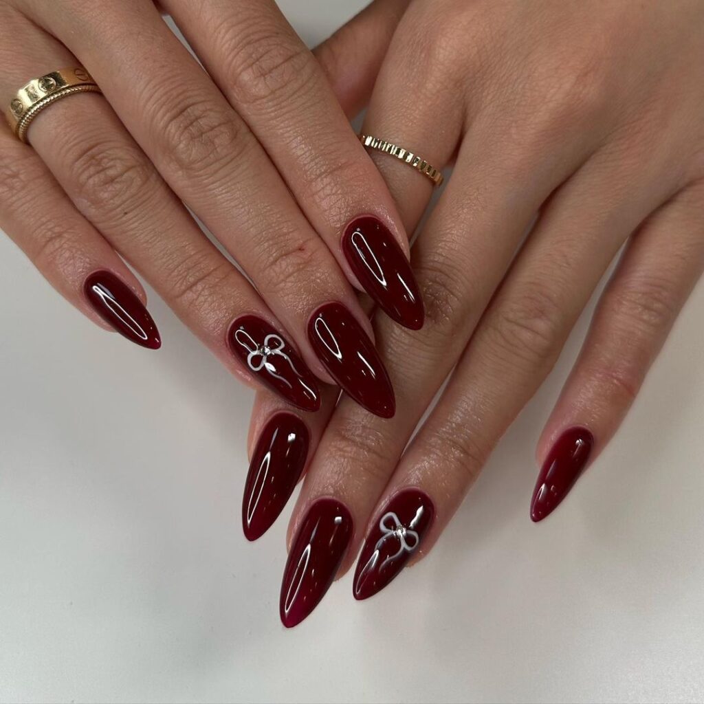 Dark Red Nails With A Bow 