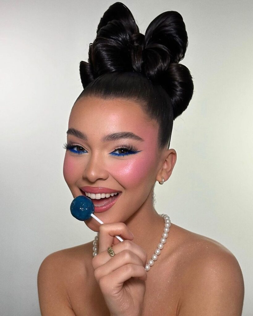 Pink Makeup With Blue Eyeliner