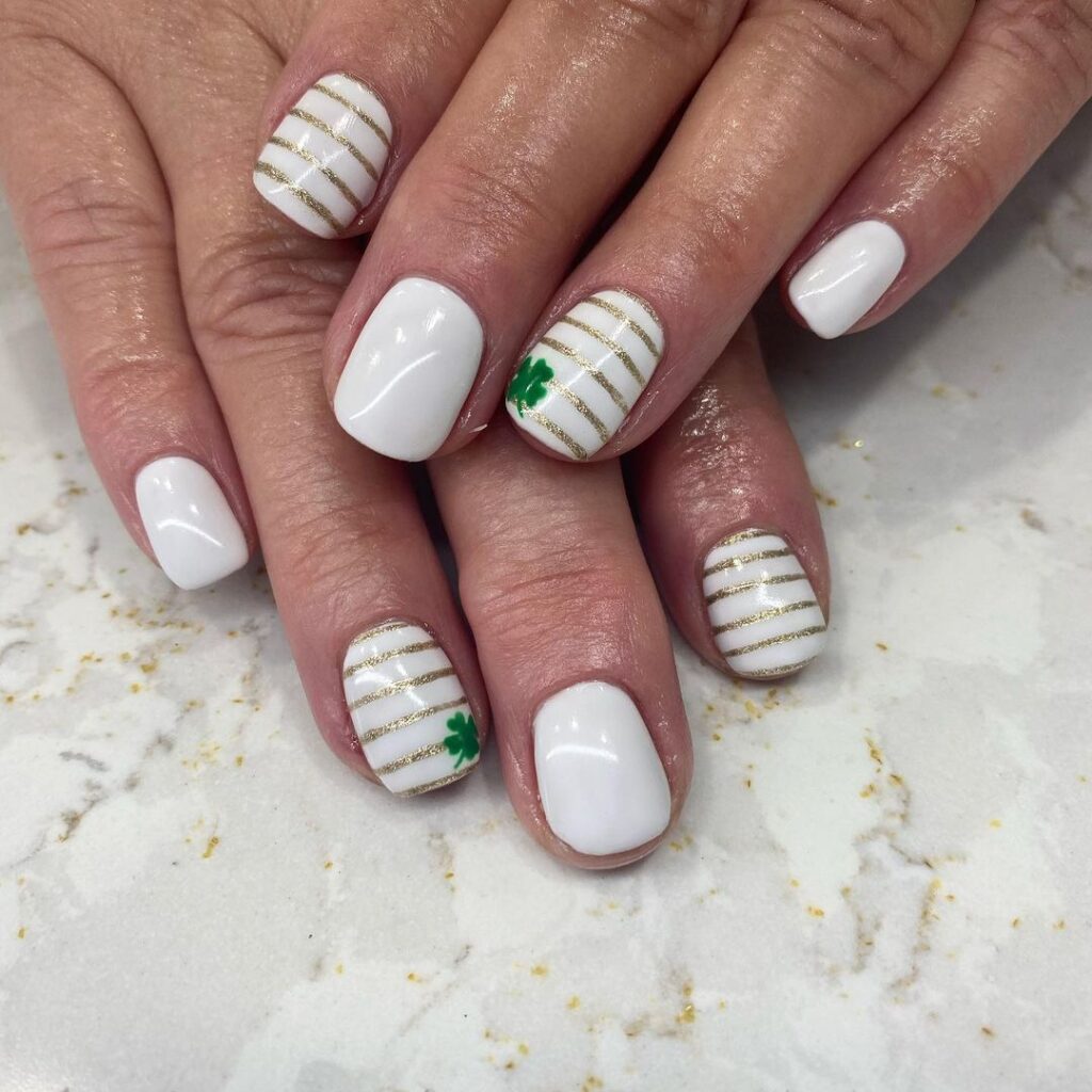 clover on white nails.jpg