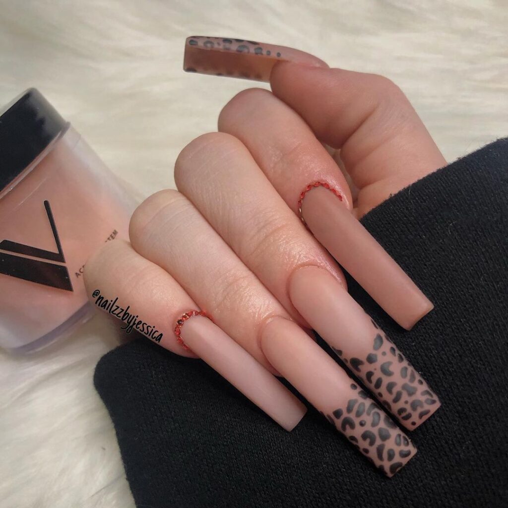 extra long nude nails with animal print