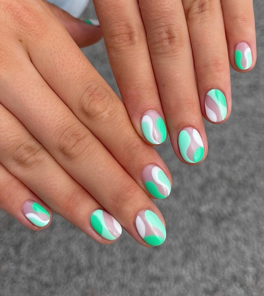funky mint green and white set of nails