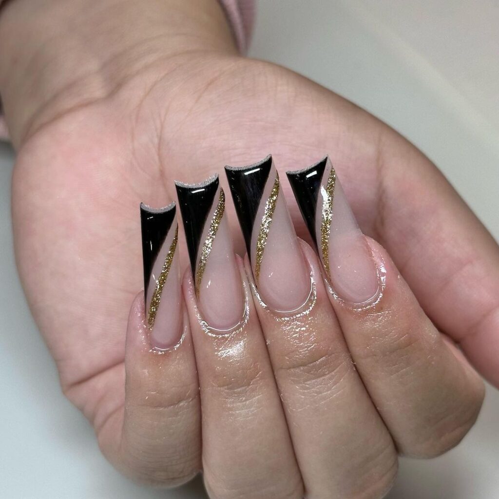 gold and black acrylic nails