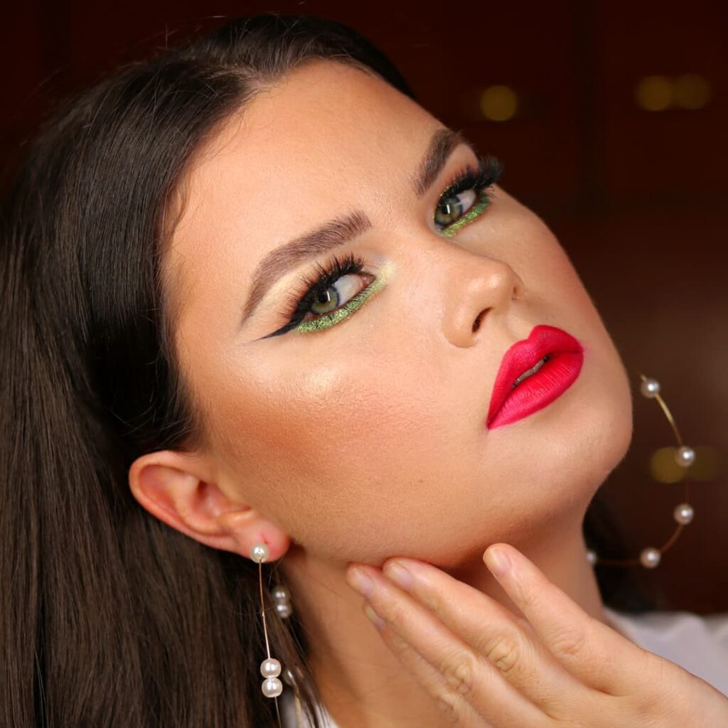 green pigments and red lips prom makeup for green eyes