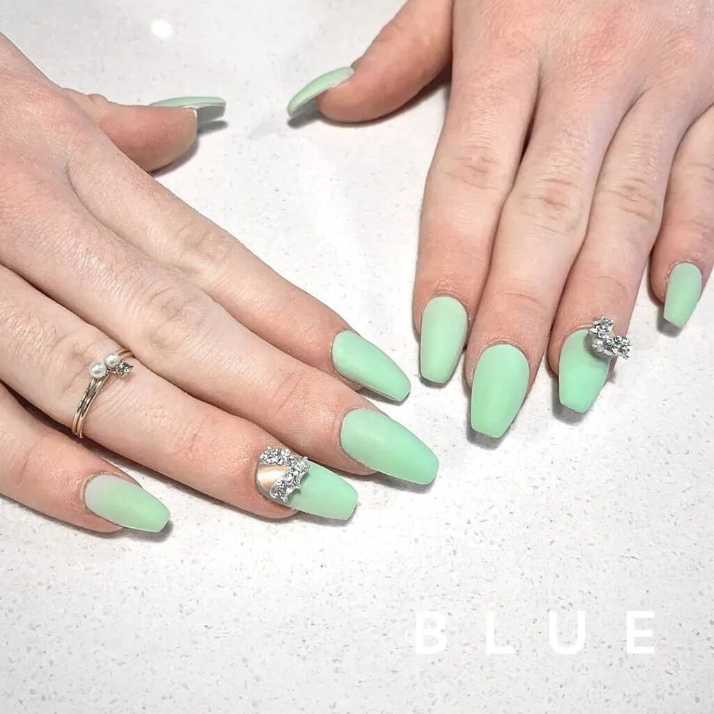 matte mint green with silver jewelry