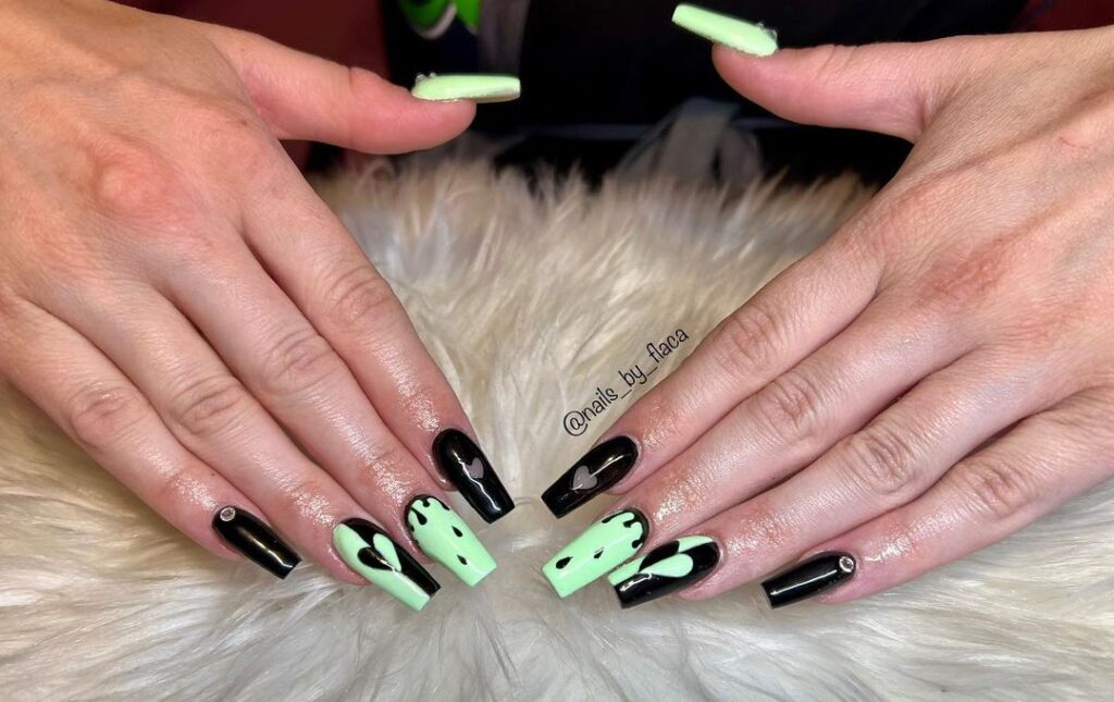 mint green and black nails