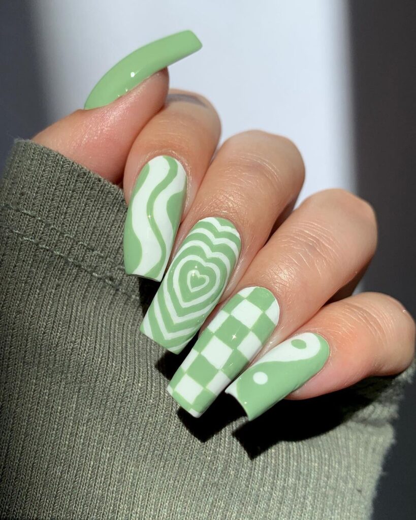 mint green nails with white nail art