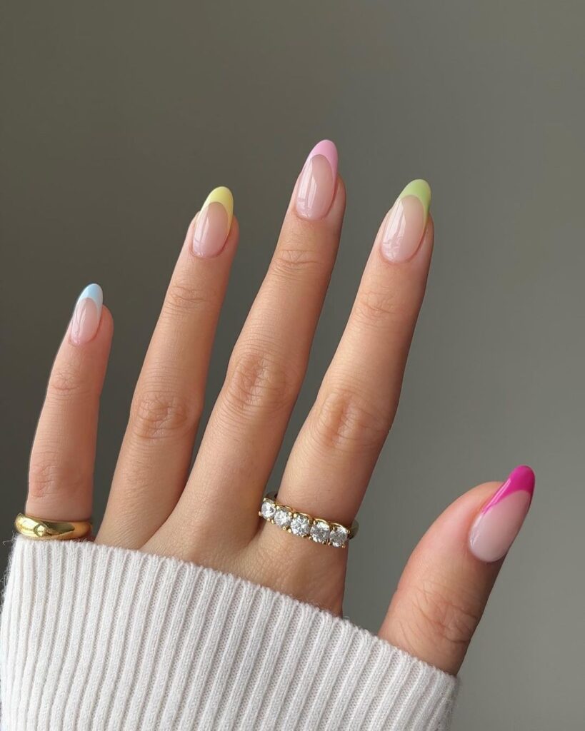 multicolored french tips on short clean nails