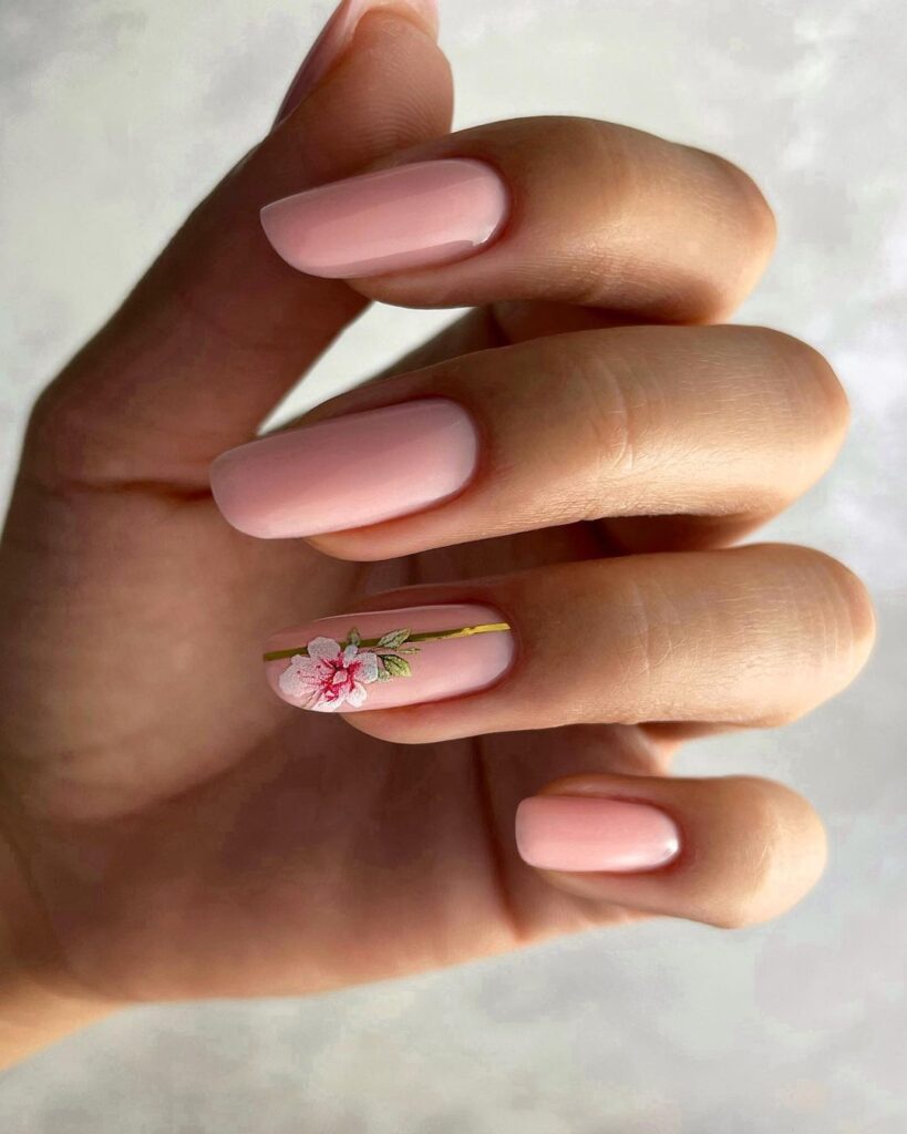 nude nails with floral art