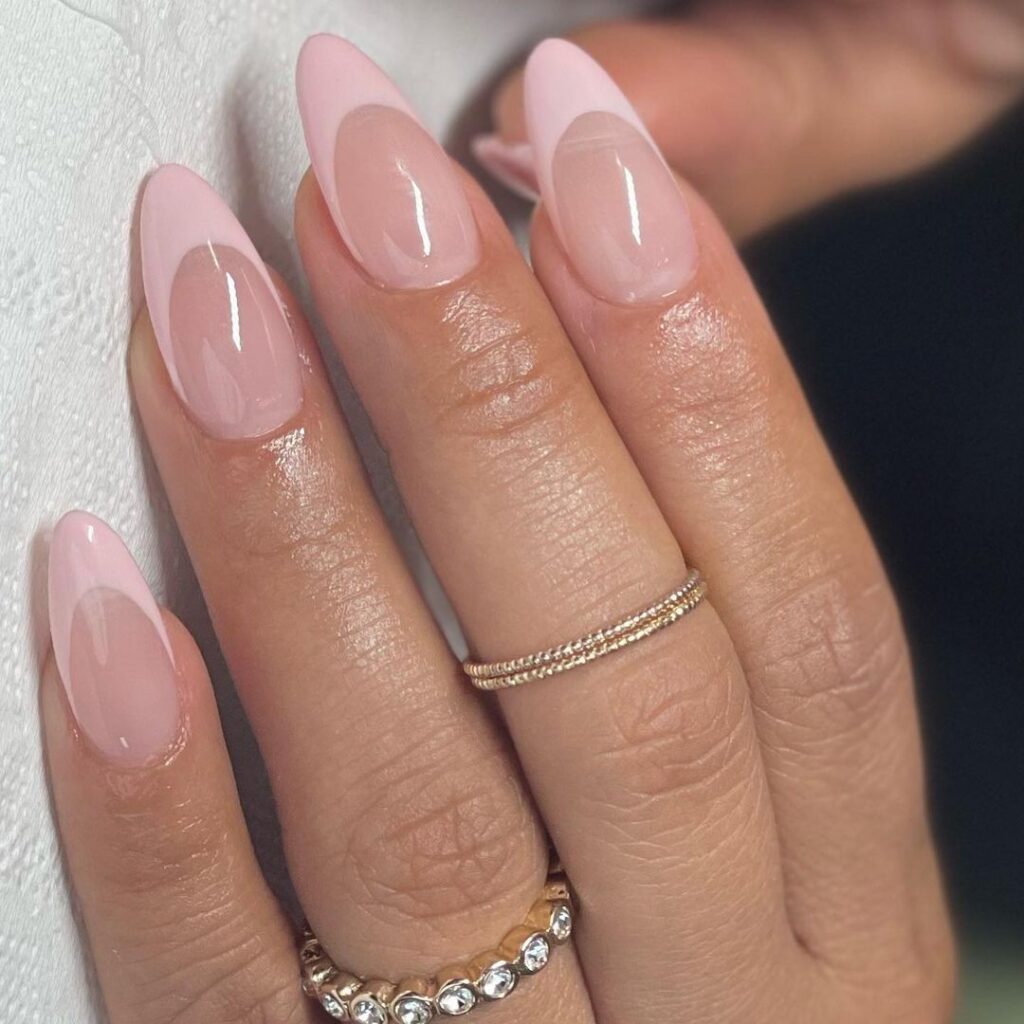 pastel pink french tips on short clean nails