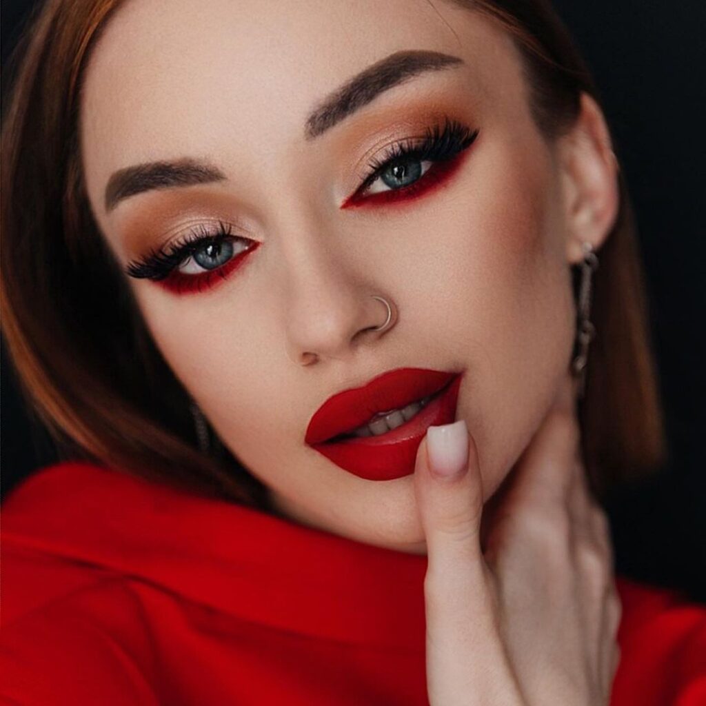 red undereye liner and lipstick