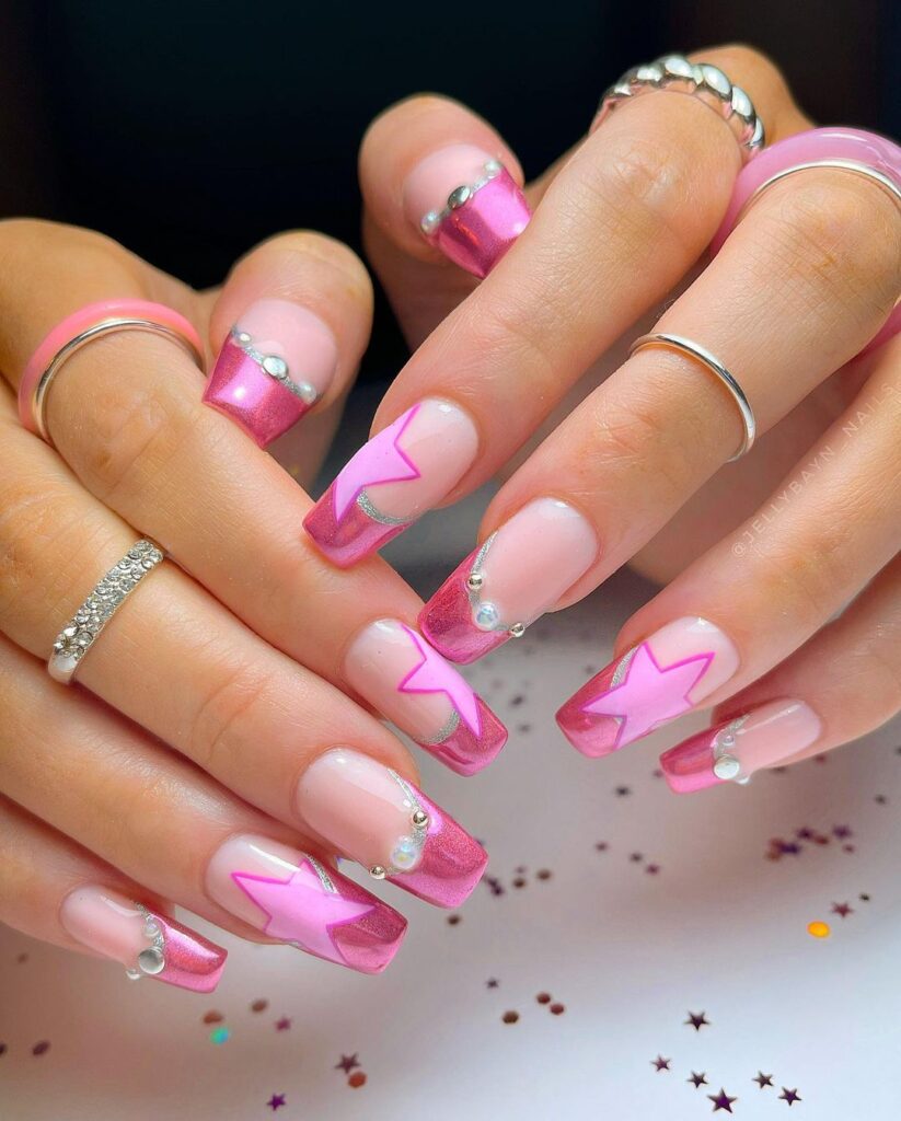 stars and gems on pink nails