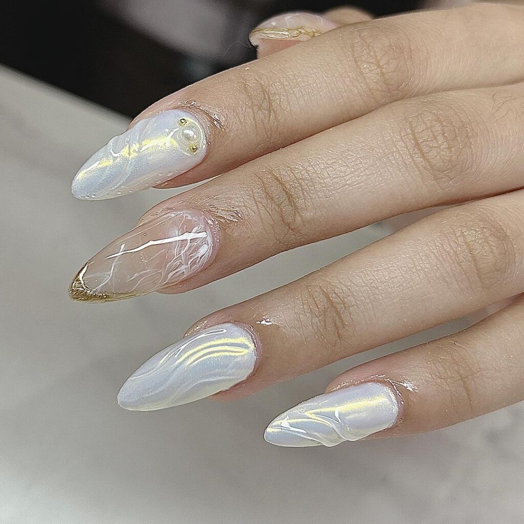 white chrome nails with swirls