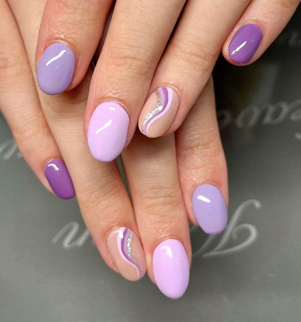 Elegant Gradient Purple Nails With Swirls