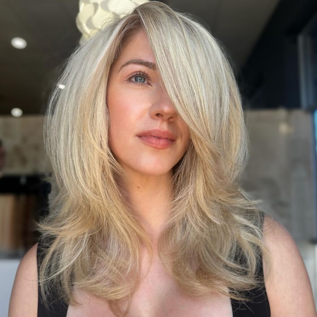 blonde blowout with side bangs