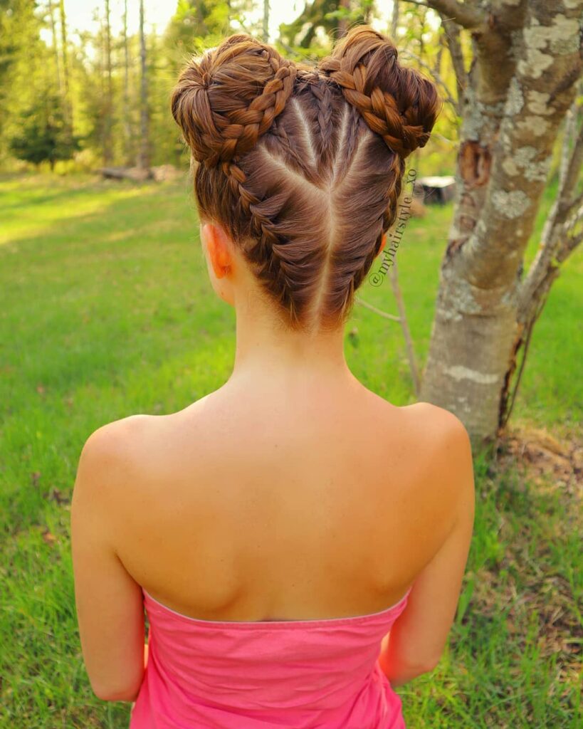 braided space buns cowgirl hairstyle