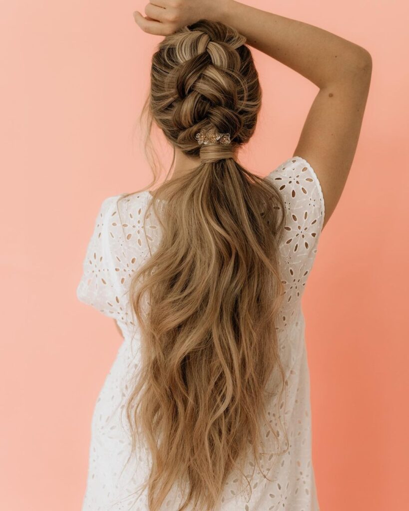messy ponytail with braided upper part