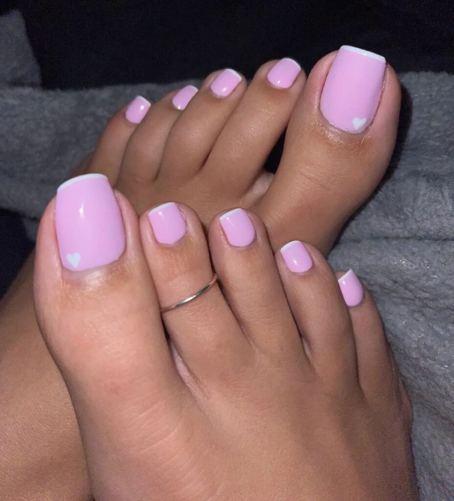 pastel base and white french spring toe nails