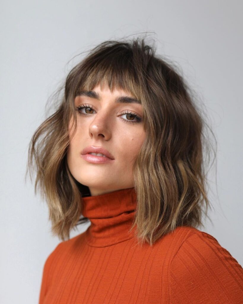 textured lob with short bangs