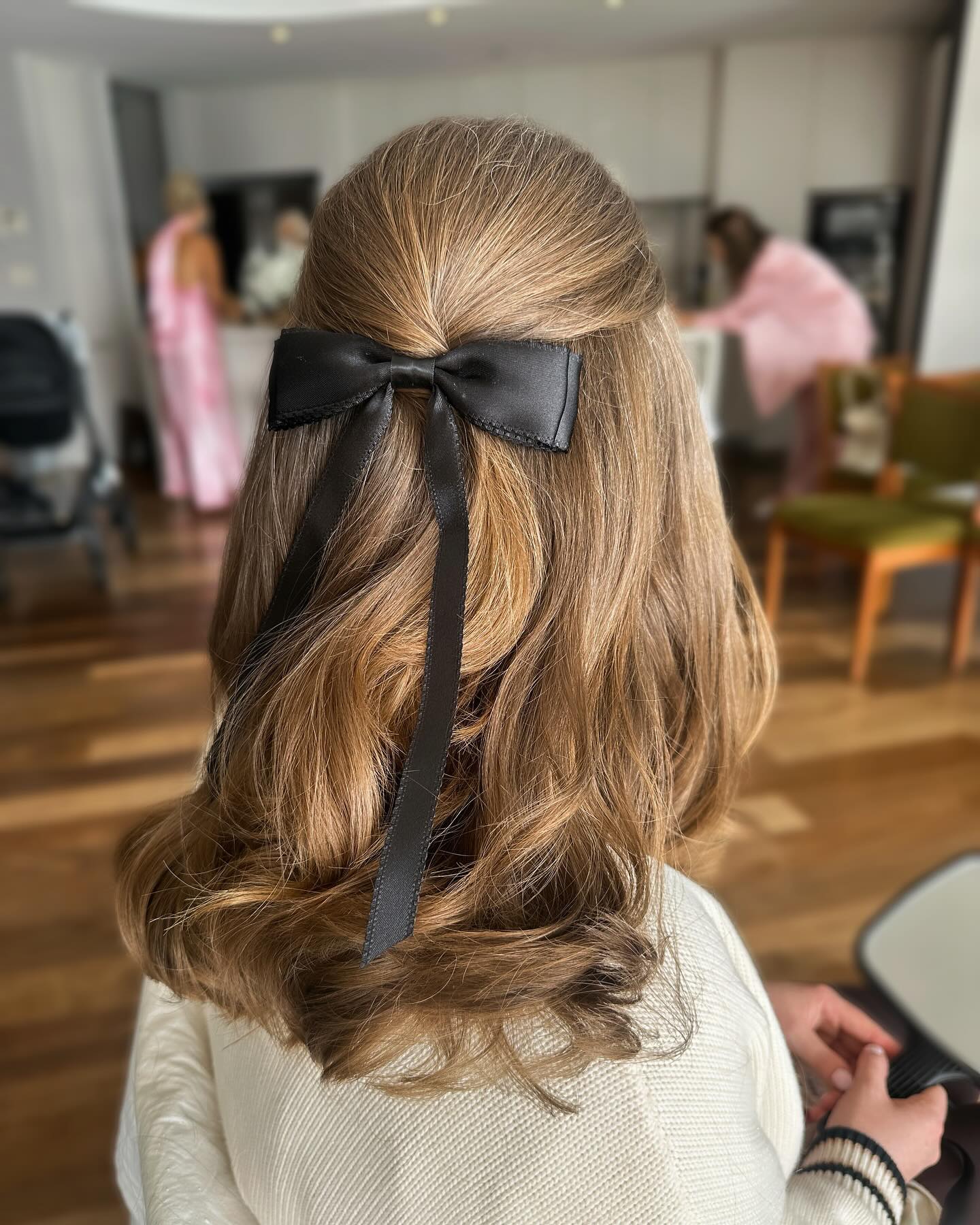 half updo with bow