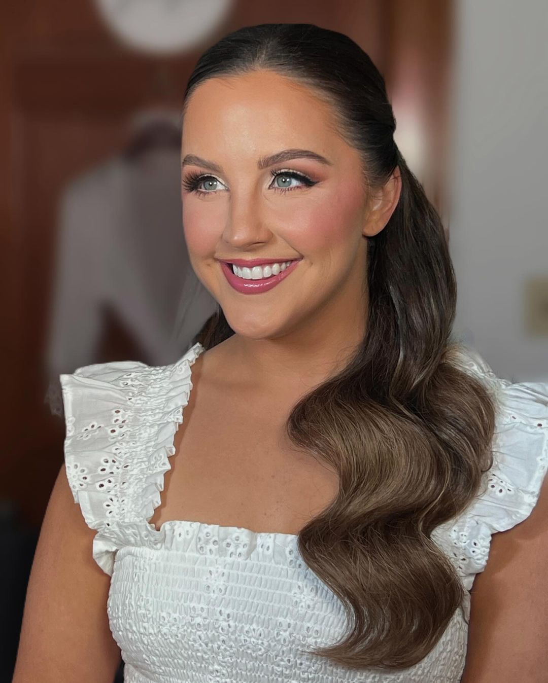 sleek front half-up half-down prom hairstyle