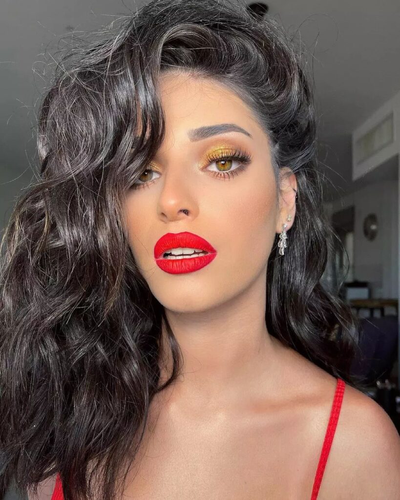 Shiny Gold Eyeshadow And Red Lipstick
