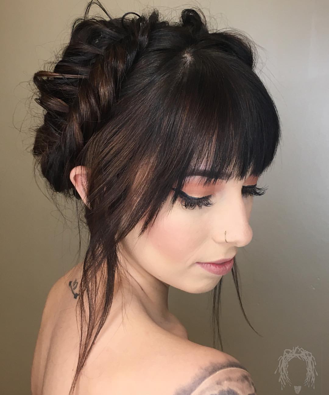 crown braid updo with crescent bangs