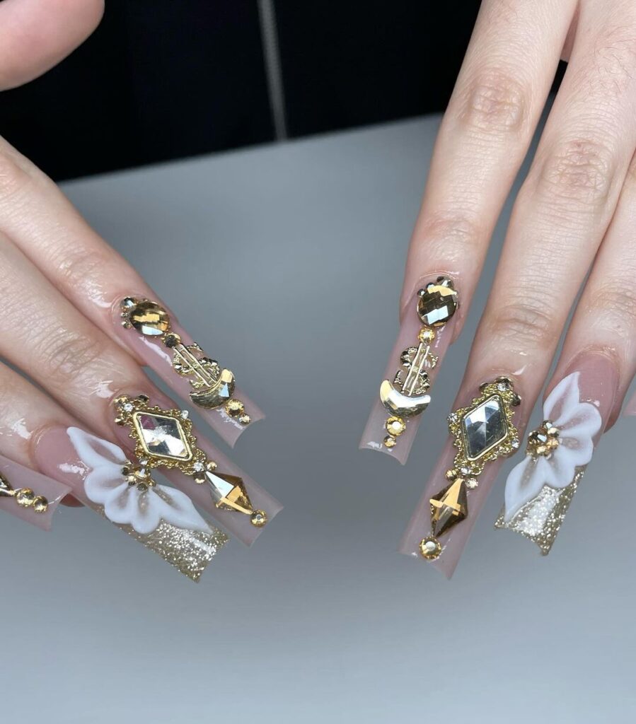 gold baddie nails