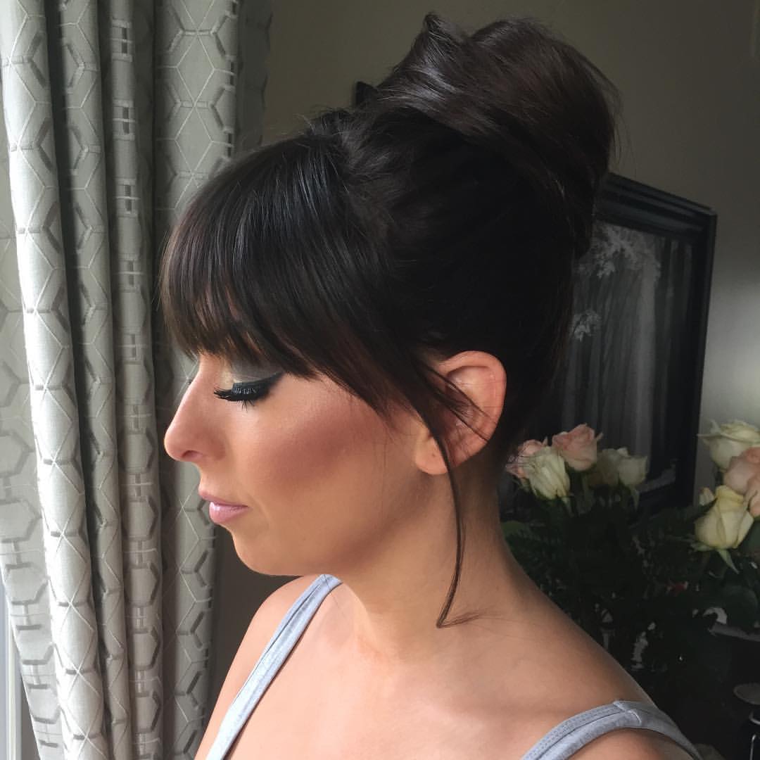 high bun with tapered bangs