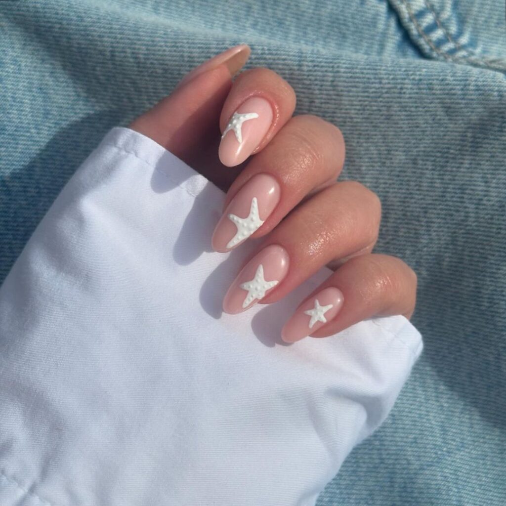 seashell art on simple summer nails