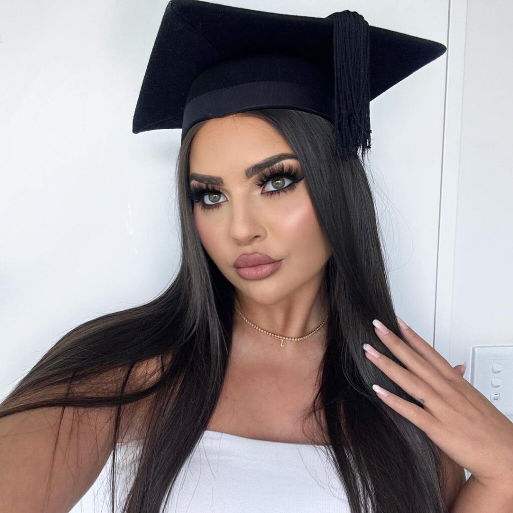 shiny long straight hairstyle for graduation with cap