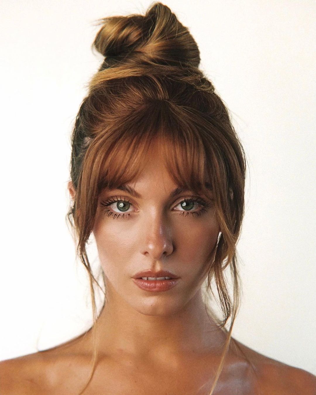 top knot with curtain bangs