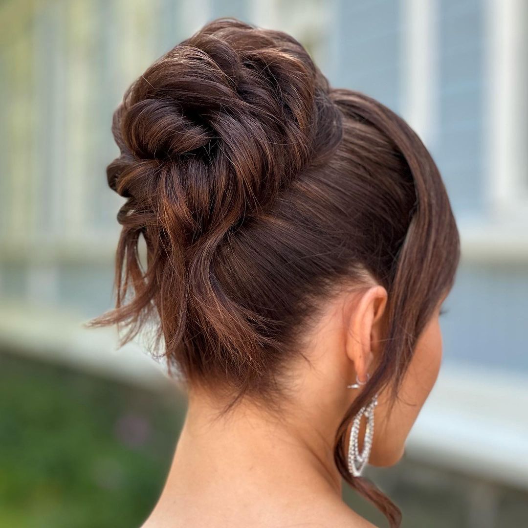 twisted chignon with side-swept bangs