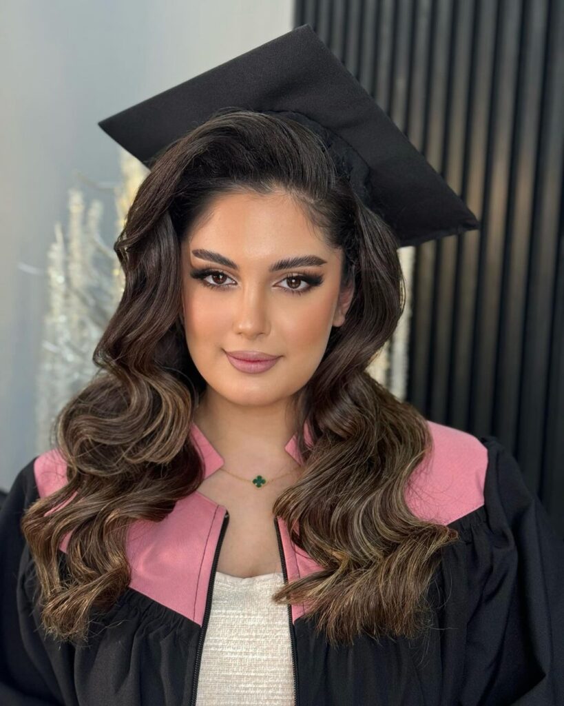 voluminous graduation hairstyle with cap