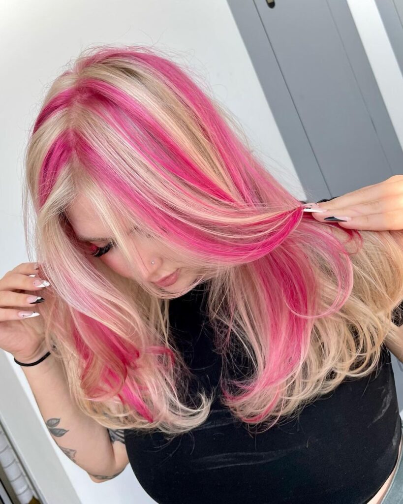 chunky pink highlights on blonde hair