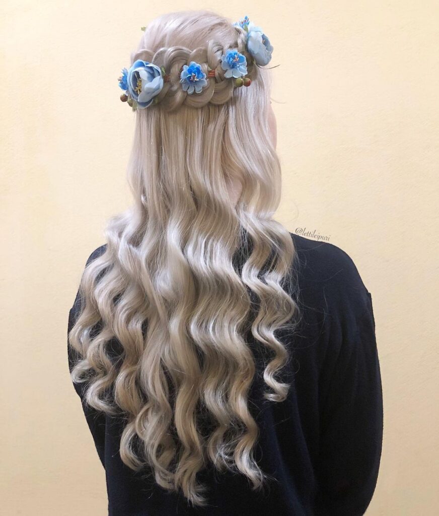 crown braid with floral hair accessories