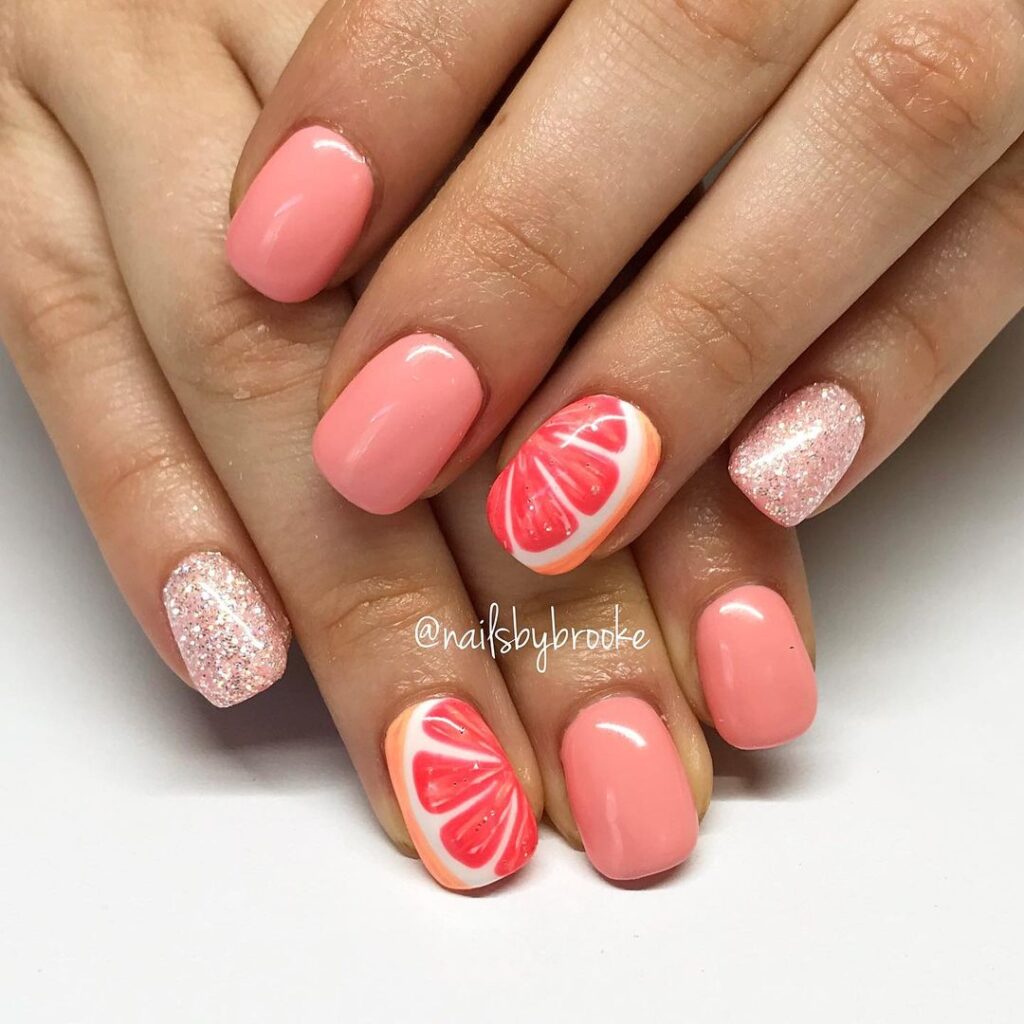 grapefruit nails with glitter art