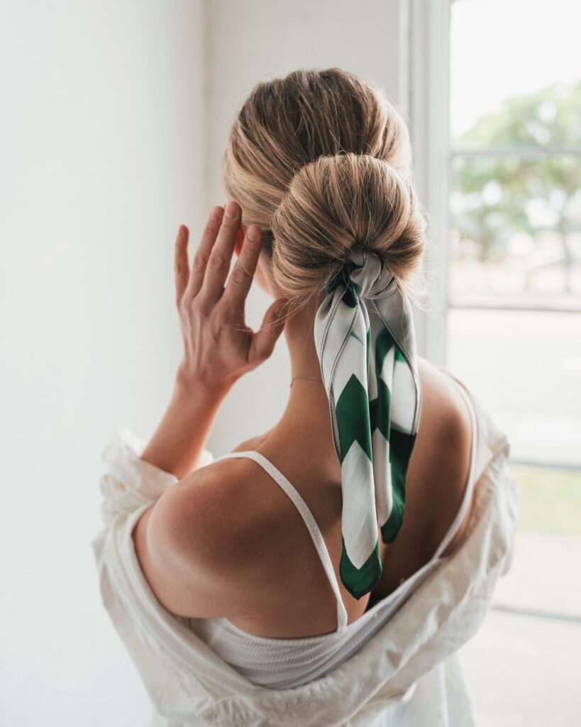 low bun with head scarf