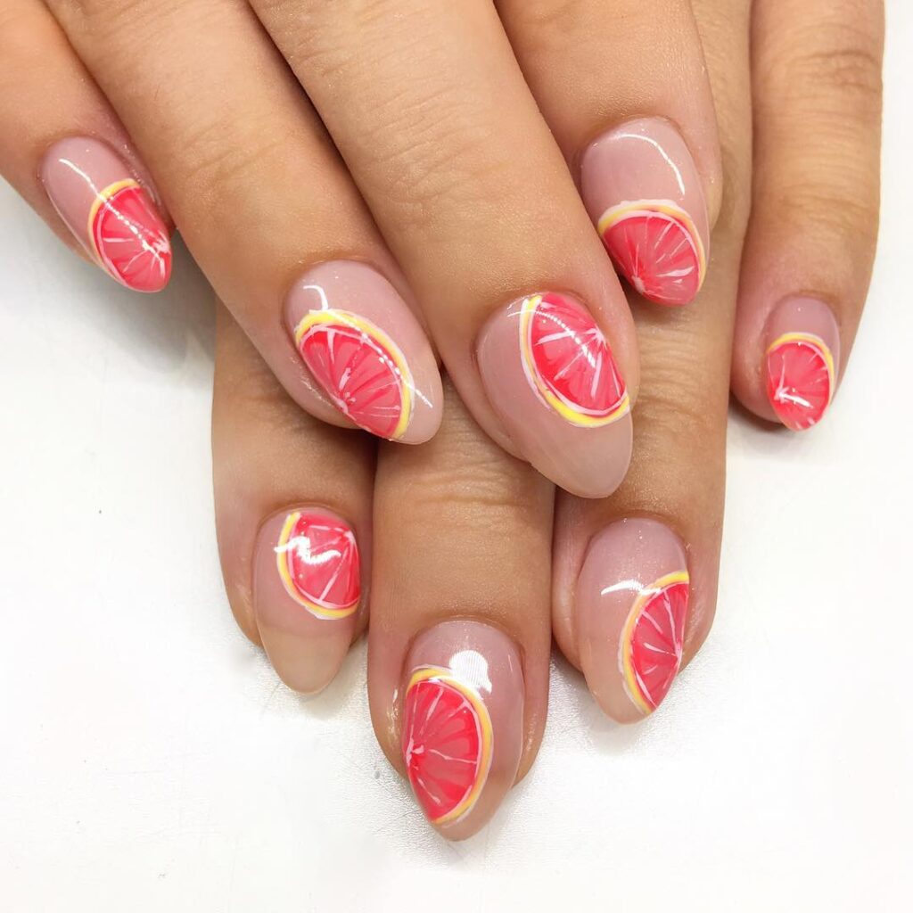 nude and grapefruit nails