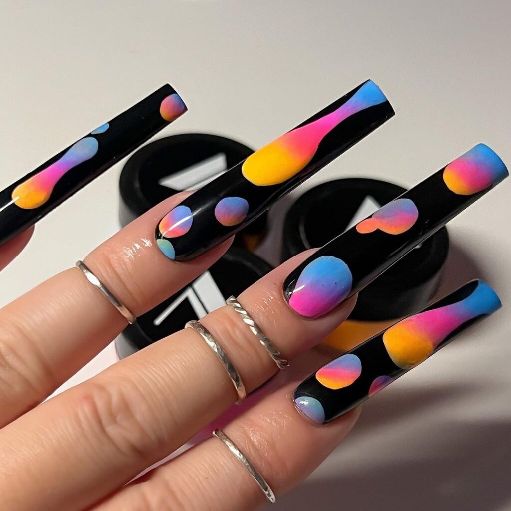 pastel 90s art on black nails