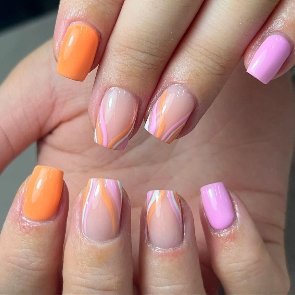 baby pink and orange summer nails